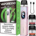 Vaporesso XROS 6 vape device in a pink gradient finish with a black mouthpiece, shown alongside its green and black retail box, a black USB charging cable, two disposable pods with black tops and clear bodies, and a prominent nicotine warning label.