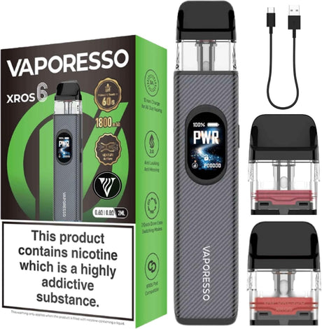 Vaporesso XROS 6 disposable vape device shown with its retail box, a USB charging cable, and two empty pod cartridges on a plain white background.
